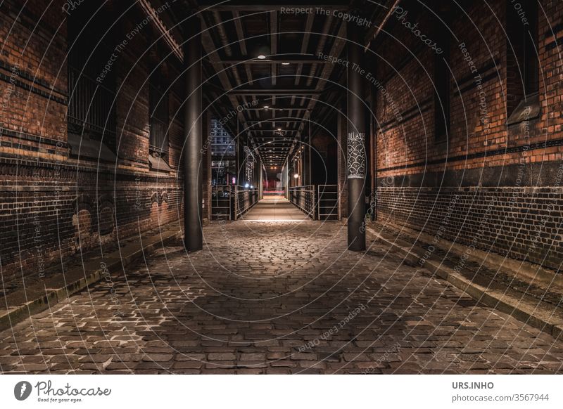 Walk through a dark cobbled alley | night light between brick houses Alley Passage Cobblestones off Brick Old town Deserted Street pedestrian walkway