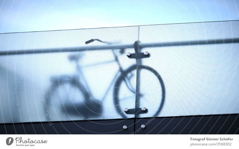 Bike behind parapet Bicycle hollandrad bridge Frosted glass Sports