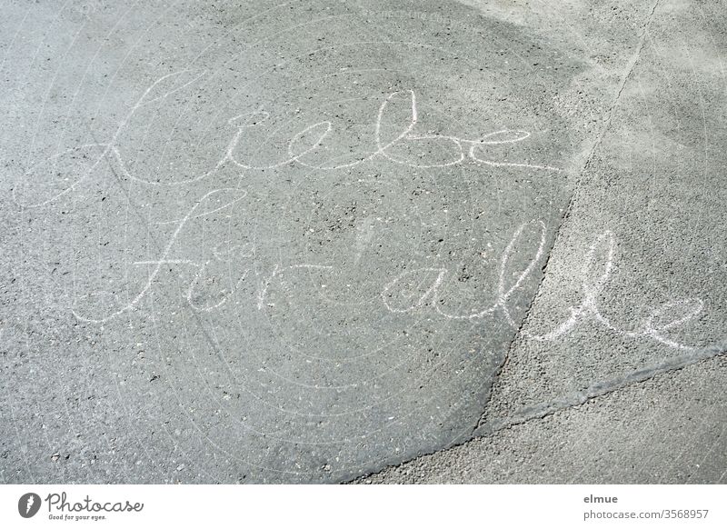 "Love for all" is written in cursive with chalk on the concrete floor love for all Communication Concrete floor letter Street equality Fair embassy Message luck