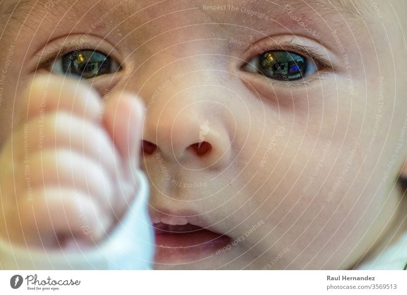 Baby Eyes Transmitting Peace And Tenderness sweet purity mouth neck nails grace defend pure delicacy calm careful eye one caucasian white closeup comfortable