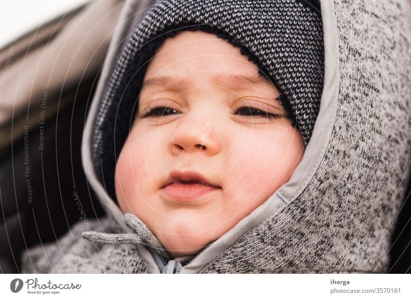 portrait of adorable baby lying babycare babyhood beautiful beauty boy caucasian child childcare childhood closeup cute emotion excitement expression eyes face