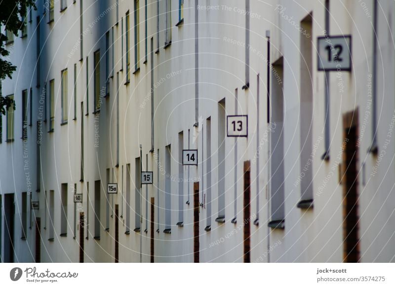 House numbers from 16a to 12 in one street Facade Arrangement Perspective Digits and numbers Wall (building) apartment building Architecture Row typo Sequence