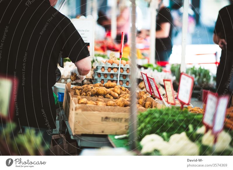 Weekly market - at the vegetable stand Marketplace Farmer's market Vegetable Market stall Sustainability salubriously Organic produce Merchant consumer buyer