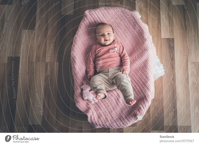 Cute Baby Lying In The Basket Top View A Royalty Free Stock Photo From Photocase