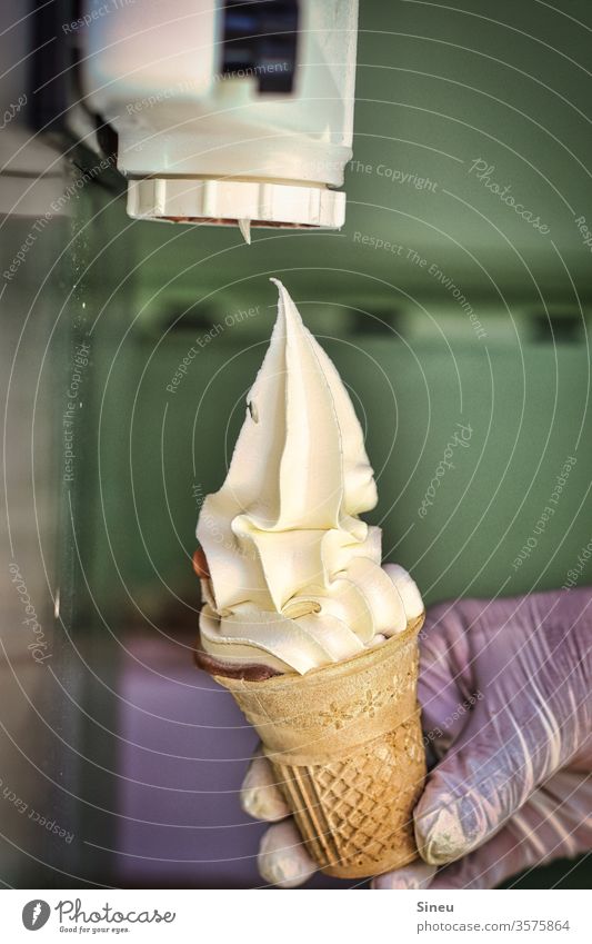 soft ice cream Soft ice cream Ice cream Dairy Products Ice-cream cone Waffle Dessert Sweet Nutrition Food Eating chill Delicious To enjoy by hand rubber gloves