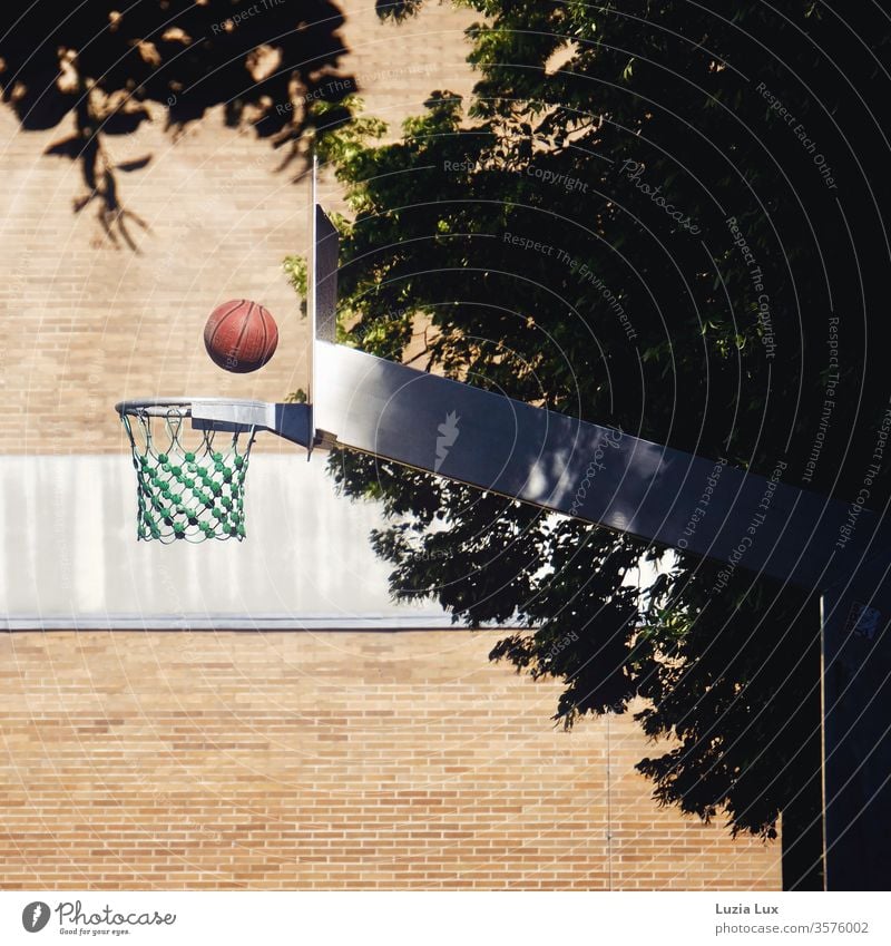 Basketball, red ball in flight to the basket Basketball basket Wall (building) Red Net Facade Colour Brick Brick wall Brick facade Deserted Wall (barrier)