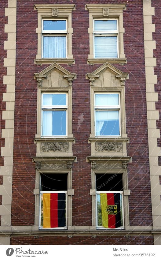 German I Neighbourhoods Germany Town House (Residential Structure) Building Window Facade High-rise flag German flag Architecture Neighbor neighbourhood
