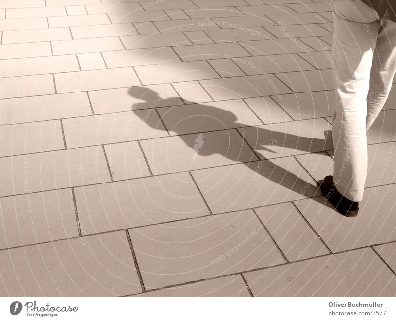shadow man Man Sidewalk Going Legs Walking Shadow Floor covering Paving stone
