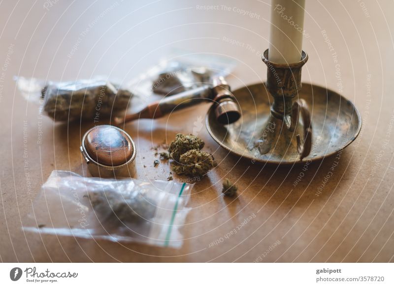 Cannabis in bags on the table Hemp Plant Intoxicant green Alternative medicine Close-up Colour photo Deserted Day Smoking thc Intoxication