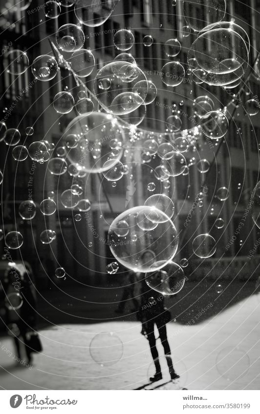 Big and small bubbles in the city soap bubbles Many Soap Bubble Man Joy Bubble world Leisure and hobbies fun