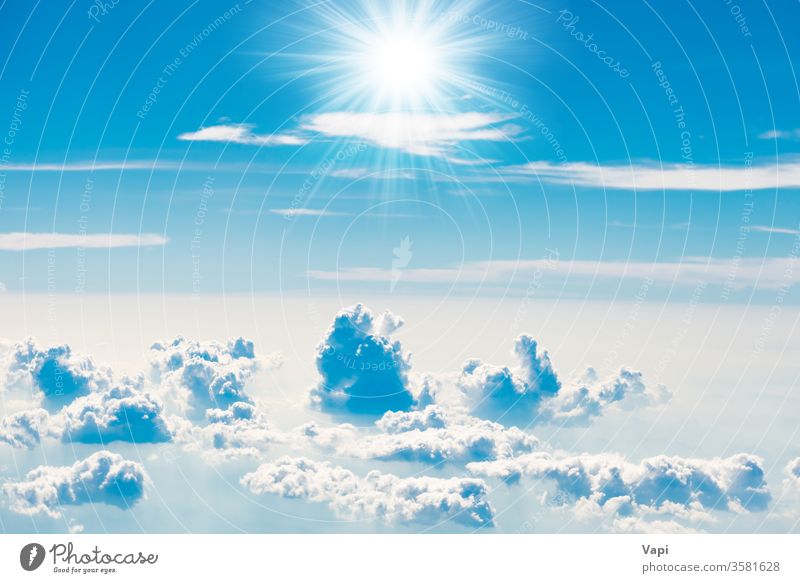 Blue sky with white clouds sun nature blue background cloudscape aerial sun rays light color beautiful day high cumulus weather sunlight summer beauty air