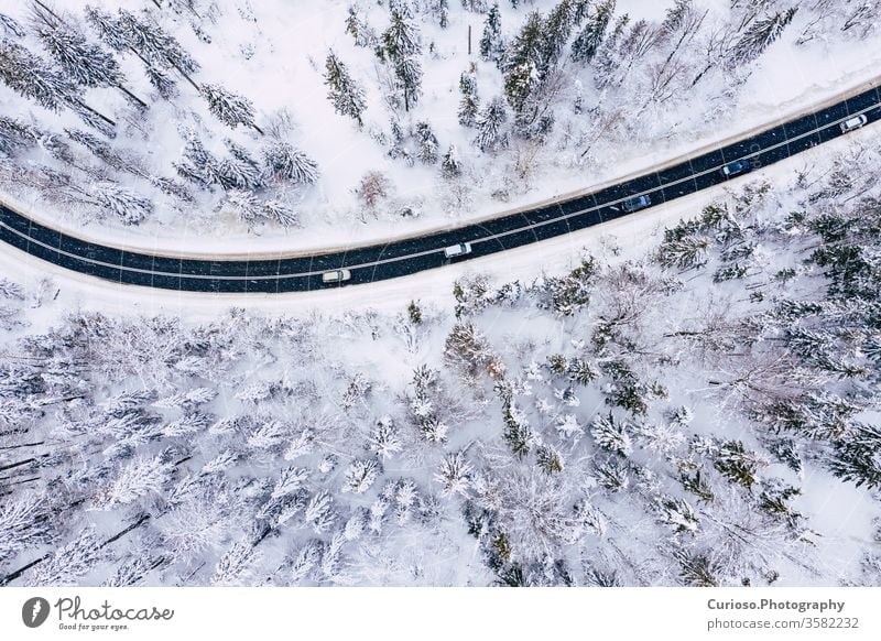 Curvy Windy Road In Snow Covered Forest Top Down Aerial View Winter Landscape A Royalty Free Stock Photo From Photocase
