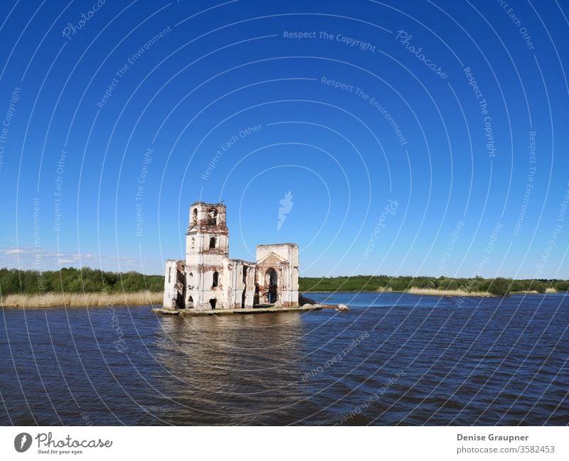 church on the rybinsker reservoir russia river architecture water landmark landscape religion travel old sky tower city tourism belfry cathedral history nature