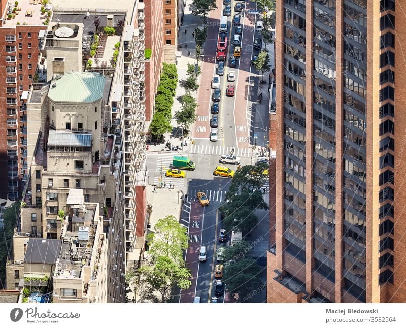 Aerial view of a street and buildings in downtown New York, USA. city traffic york new urban new york usa manhattan taxi car aerial america avenue crowded nyc