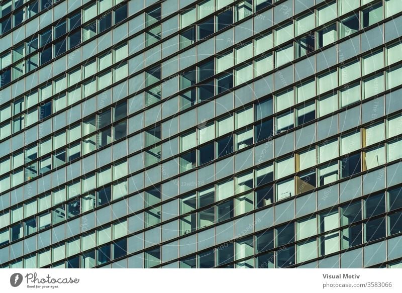 Rows of glazed windows of the facade of a modern office building rows glass urban architecture metropolitan financial contemporary outdoor district area