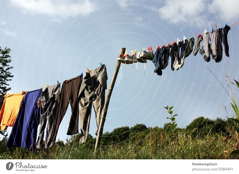 Clothesline against sky - a Royalty Free Stock Photo from Photocase