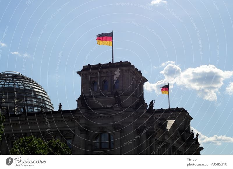 Reichstag Berlin with dome and flags Reichstag dome Reichstag building Government Architecture Capital city German Flag Seat of government Copy Space Tourism
