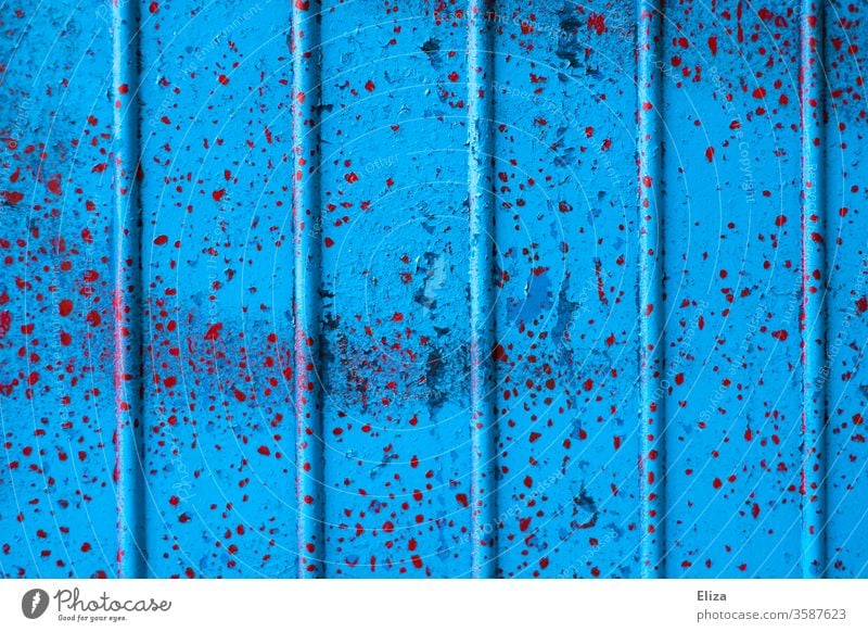 Blue metal background with red speckles Red Mottle Metal texture structure lines Vertical subdivided graphically Abstract Colour worn-out Patina Grunge urban