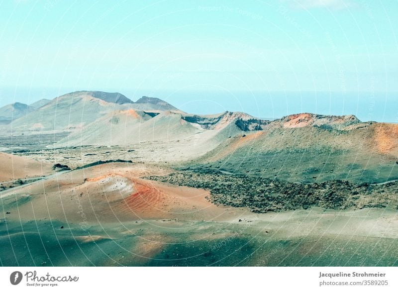 Montañas del Fuego, Timanfaya National Park, Lanzarote, Spain Geology Trip Deserted Rock formations Black landscape Travel photography Clouds volcanoes