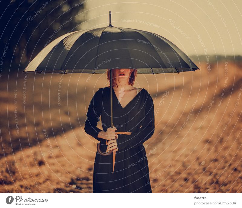 Woman with umbrella Umbrella Protection Umbrellas & Shades Sun Weather Hide