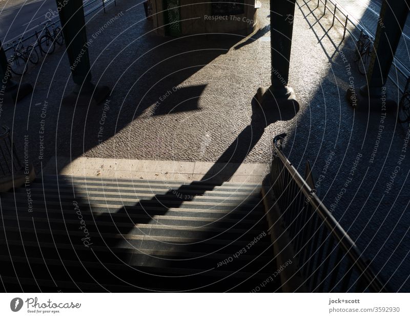 Rise for the big exit Wide angle Stairs Low-key Silhouette Sunlight Shadow Structures and shapes Abstract Shadow play Time Moody Emotions Lanes & trails