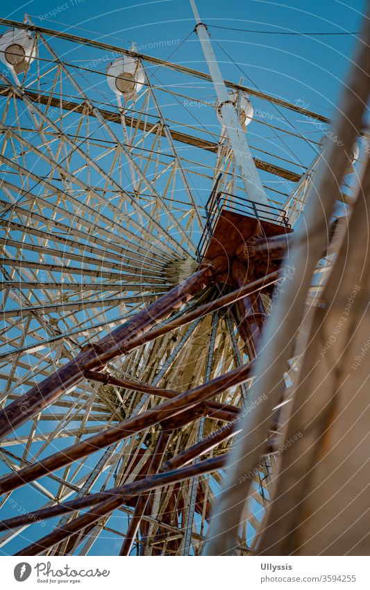 Portrait of a view from below of the Skyranch amusement park's Ferris wheel pleasure Attraction background Bavaria Blue Carnival Carousel celebration chill