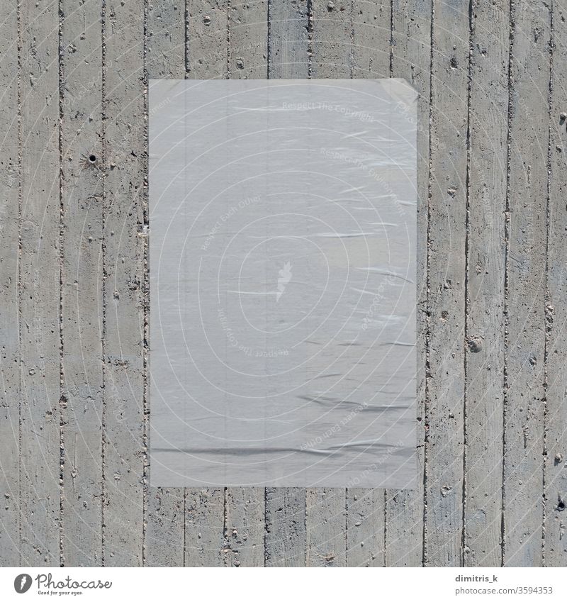 white crumpled poster on concrete wall background mockup blank paper wheatpaste design element empty textured rough grungy copy-space creased plastered wrinkled