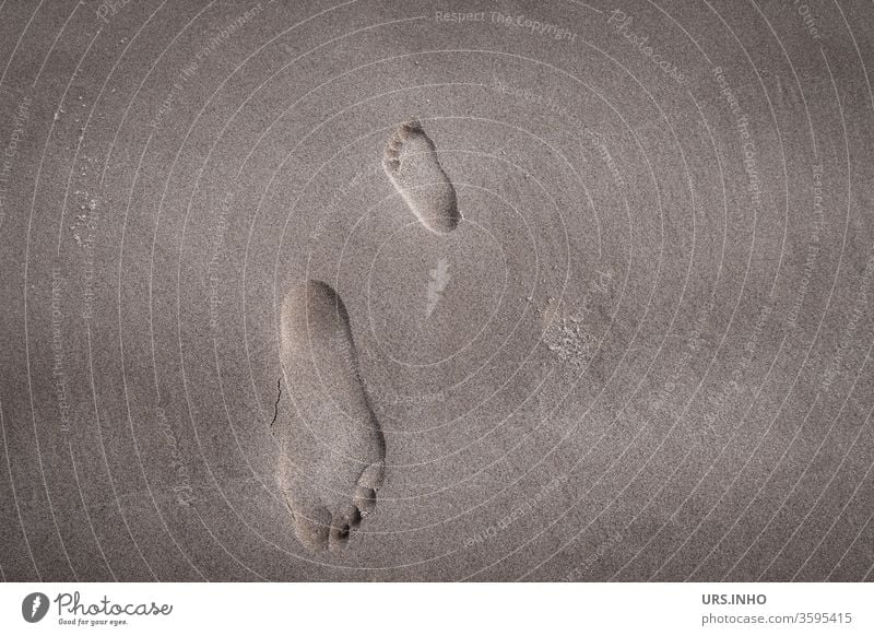 Footprints in the sand, when children walk barefoot in another direction footprint Child footprint Sand footsteps Beach Direction Opposite Vacation & Travel