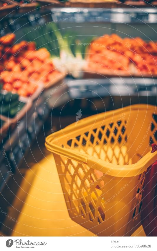 Shopping basket in the vegetable department in the supermarket Supermarket Shopping Trolley Food Vegetable fruit Department Consumption Retail sector Yellow