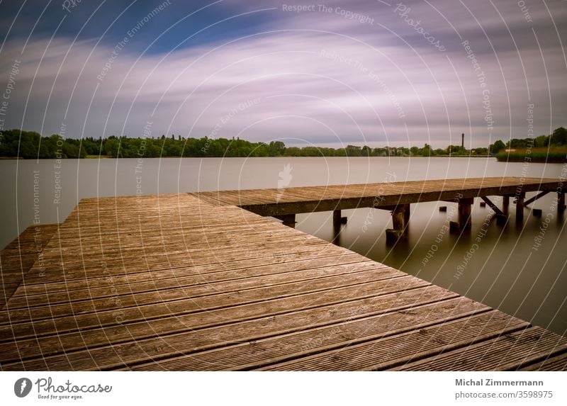 jetty at a lake Footbridge Lake Lakeside Water Surface of water Green Wood Nature Love of nature Experiencing nature Spring Exterior shot Deserted Landscape