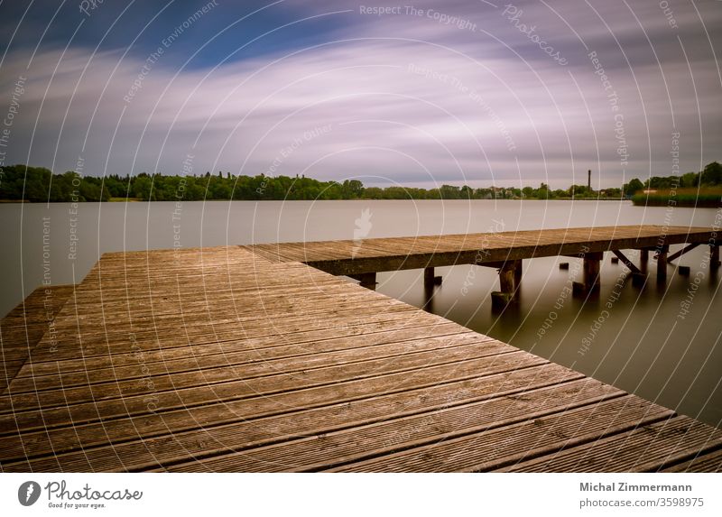 jetty at a lake Footbridge Lake Lakeside Water Surface of water Green Wood Nature Love of nature Experiencing nature Spring Exterior shot Deserted Landscape