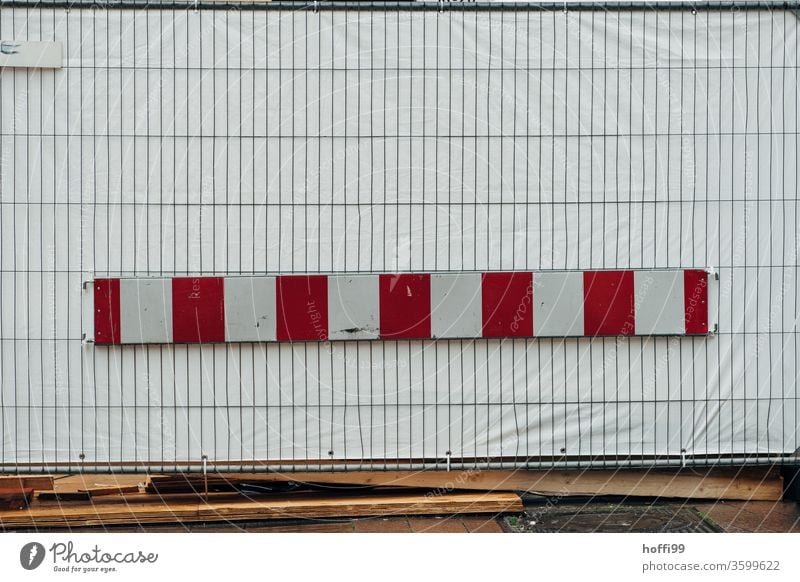 Construction site with opaque barrier and lattice fence cordon Barque Red White tarpaulin Barrier Hoarding Safety Structures and shapes Fence Metal Pattern