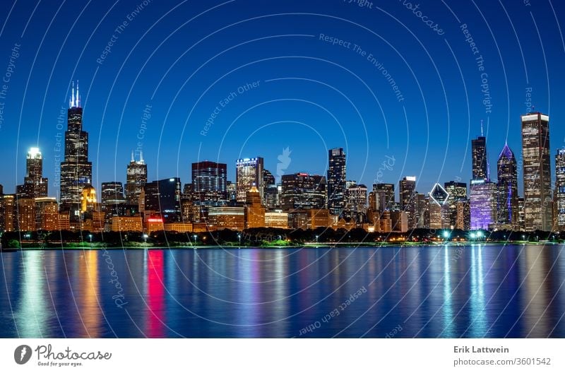 Amazing Chicago skyline in the evening - CHICAGO, USA - JUNE 12, 2019 city architecture Illinois downtown urban cityscape usa skyscraper sunset reflection river