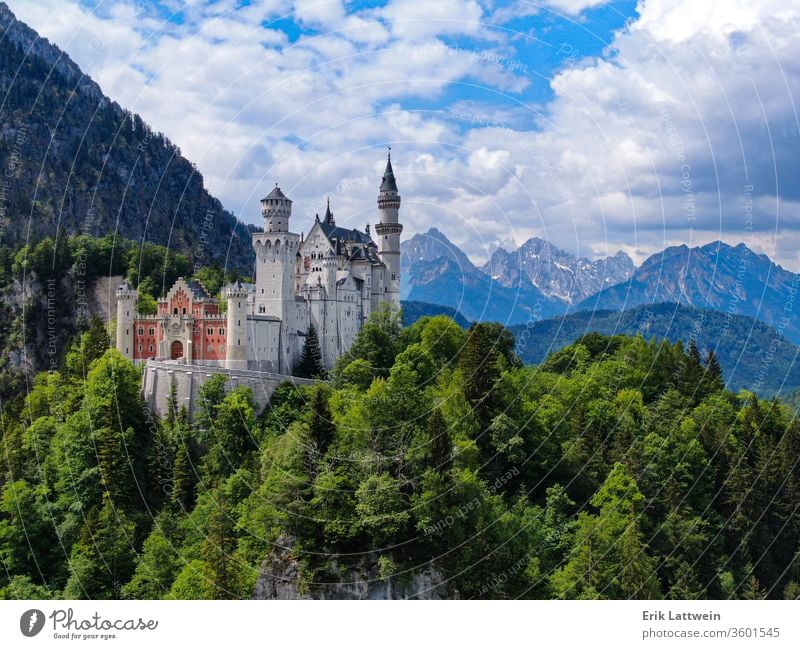 Famous Neuschwanstein Castle in Bavaria Germany castle bavaria tower germany neuschwanstein king fairy tale palace sky travel destination mountain tree fantasy
