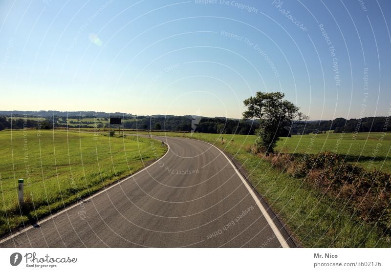 highway Country road Street Traffic infrastructure Lanes & trails Asphalt Environment Curve Landscape Nature Sky Field Meadow Beautiful weather hillock Horizon