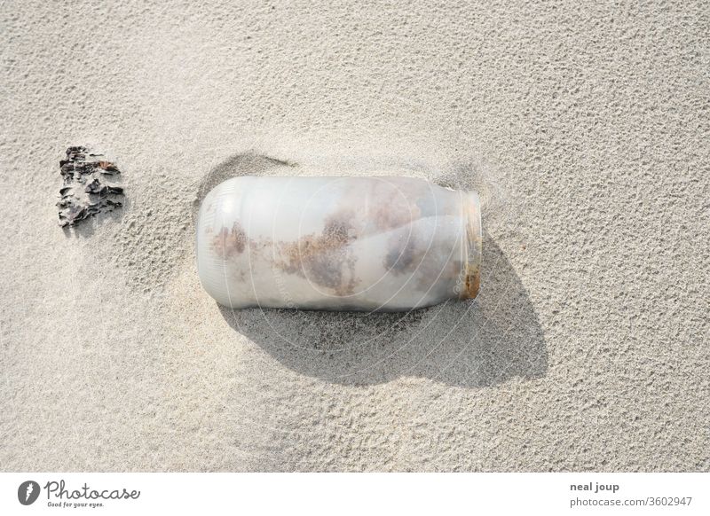 Plastic waste on the beach - container, white Environmental pollution plastic Rubber Trash Ocean Beach Sand Coast Recycling Problem Nature dirt Shackled