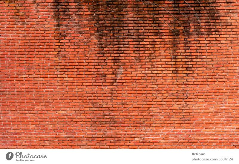 Orange brick wall texture background. Background for text. Exterior architecture concept. Dirty orange brick wall abstract background. Background for construction.