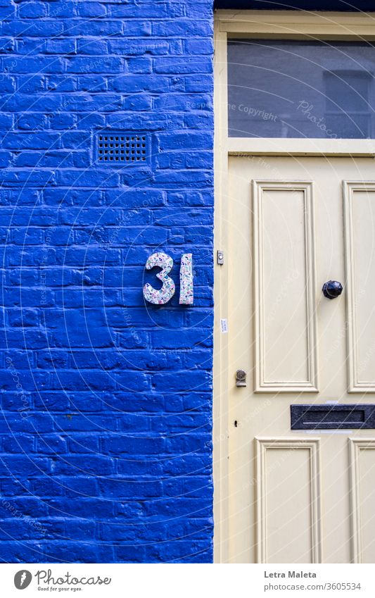 number 31 in a colorful house from Nothing Hill blue door Nothing hill london home travel house number exterior urban colorful wall