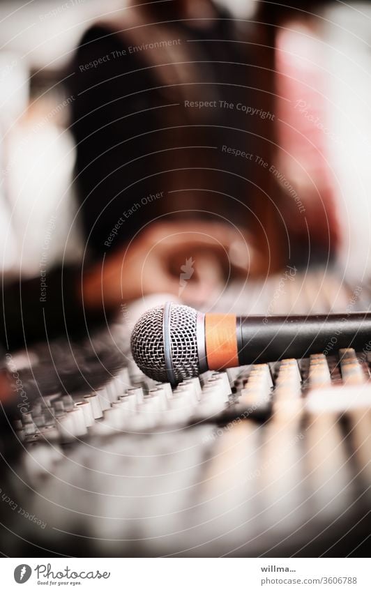 sound engineer at the mixing desk Microphone mixer Sound engineering Podcast Electroacoustics sound recording Event technology music production