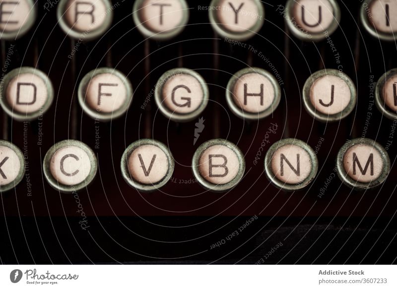 Keyboard of vintage typewriter with round buttons key keyboard retro letter old fashioned antique number alphabet nostalgia aged creative hobby art grunge