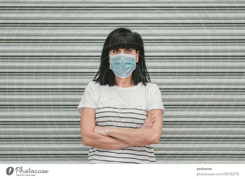 woman wearing medical mask for coronavirus on the street young woman covid-19 summer epidemic pandemic quarantine cool walk gloves health care lifestyle sign