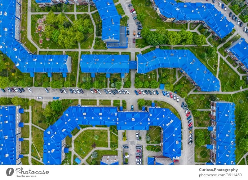 OLKUSZ, POLAND - JUNE 03, 2020: Aerial view of the housing estate with blue roofs. Estate Sloviki located on Witosa street is also called " Smurfs" Olkusz, Poland.