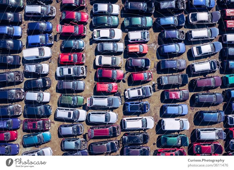 Aerial view of the junkyard. Old rusty corroded cars at the junkyard. Car recycling industry from above. Applied vehicles drones Antenna parts Scrapyard