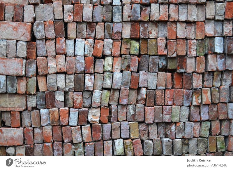 Bricks - used bricks stacked on top of each other for farmhouse restoration. Clinker bricks for North German clinker facade Northern Germany