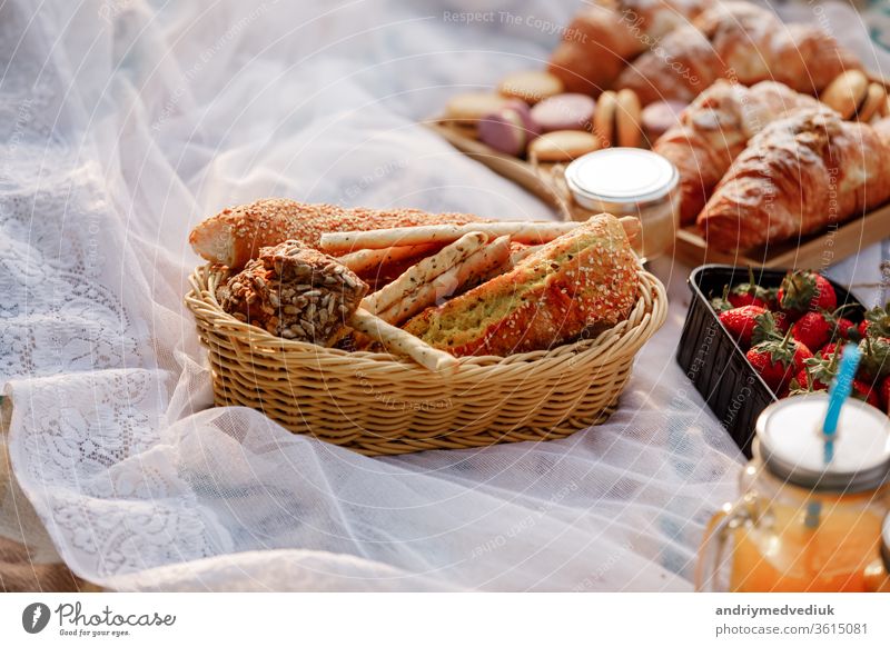 picnic in the nature, fresh pastries, croissants. French croissants breakfast bakery basket food morning snack brunch holiday lifestyle healthy outside french