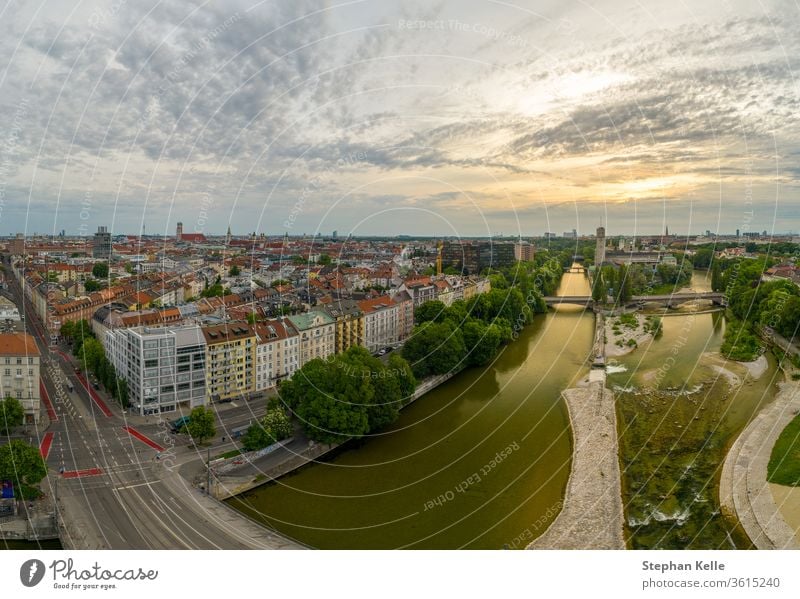 Munich view from a drone at the sunrise includes the Isar river and some popular landmarks minga aerial copter isar munich center junction landscape mountains