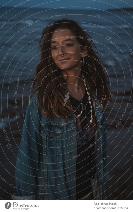 Tranquil woman at seaside in evening hippie beach sunset calm tranquil travel female ocean summer relax coast vacation water peaceful shore scenic nature