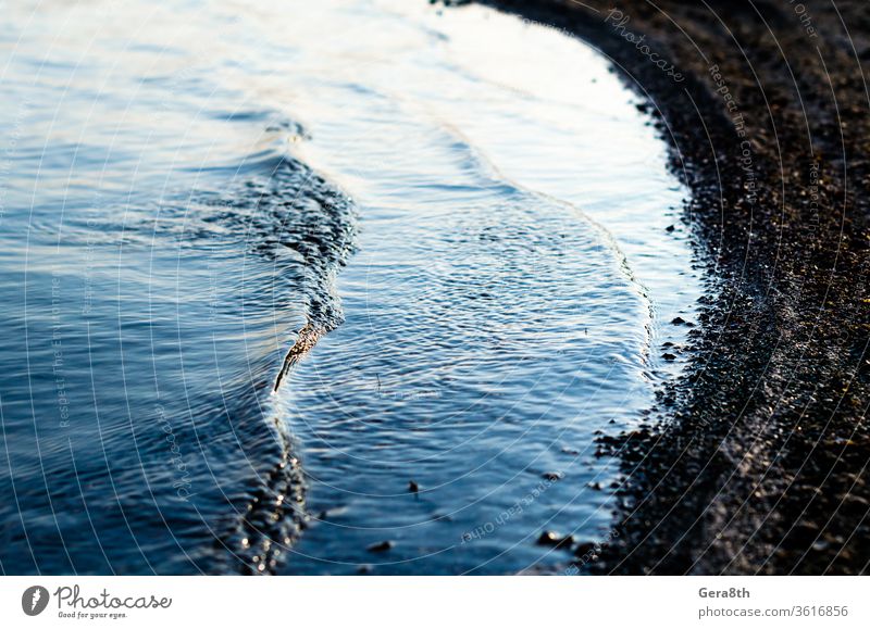 small waves near the lake shore closeup blue blue water natural nature pond river textural tide