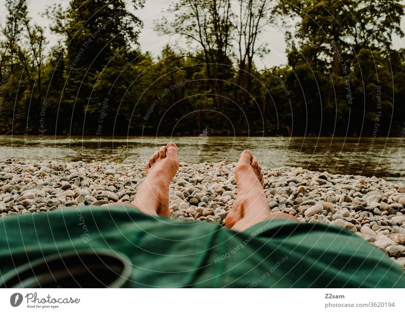 Recreation on the Isar Relaxation River Water vacation Lie Legs short Man chill Summer Exterior shot Vacation & Travel Human being Nature Colour photo Lifestyle