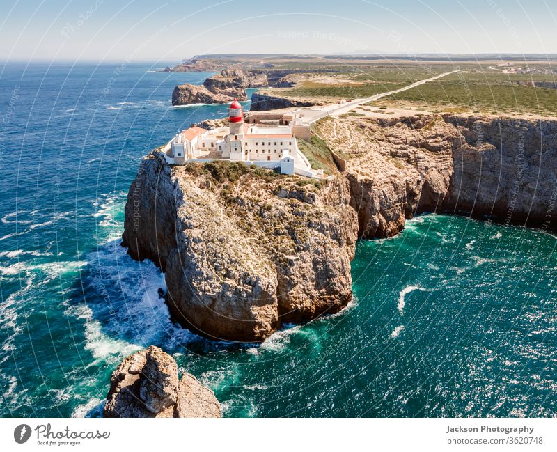 Beautiful lighthouse located on high cliffs of Saint Vincent cape in Algarve, Portugal sagres algarve portugal cabo de sao vicente ocean farol point western